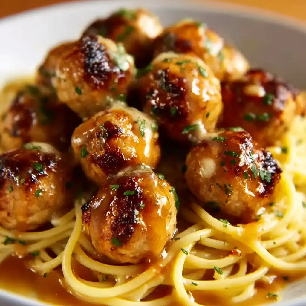 Plate the pasta and top with garlic butter chicken bites Recipe - Recipe Image