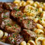 Cajun Steak Bites and Cheesy Garlic Shells Skillet Recipe