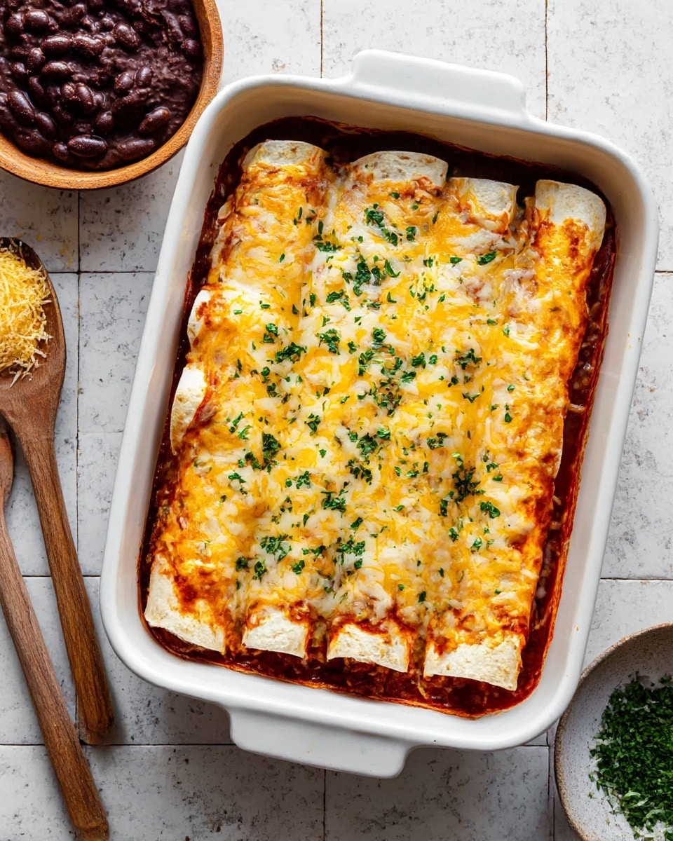 A white baking dish holds five rolled tortillas lined up side by side, each filled and covered with melted yellow and white cheese that looks soft and gooey. Underneath, a reddish sauce peeks through around the edges, adding a rich, saucy base. The dish is sprinkled with small green herb leaves, giving a fresh touch on top. The baking dish is on a white marbled surface, with some scattered herbs and rice grains nearby. Photo taken with an iphone --ar 4:5 --v 7