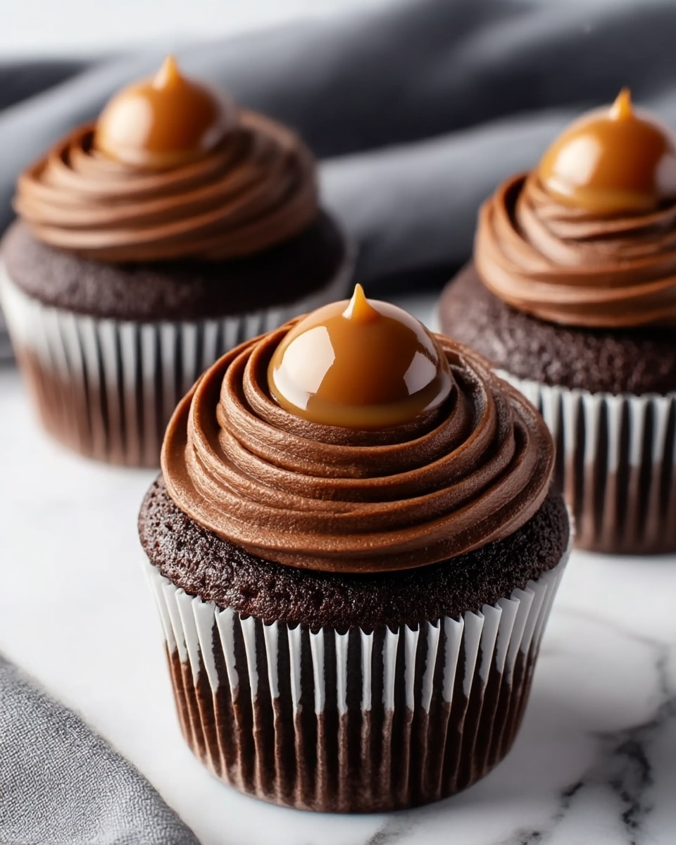 Chocolate Caramel Cupcakes with Rich Chocolate Frosting and Decadent Caramel Sauce Recipe - Recipe Image