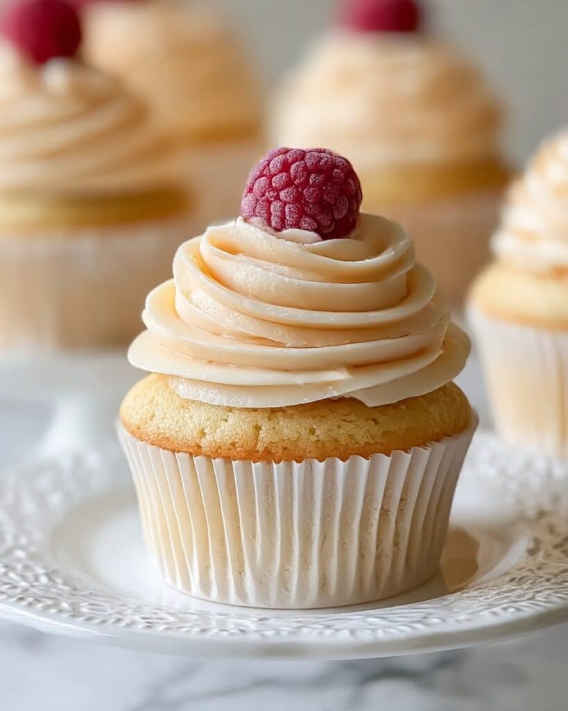 Almond Wedding Cake Cupcakes with Raspberry Filling Recipe